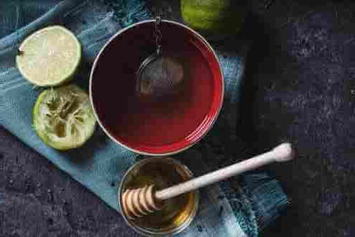 remedio casero para el dolor de garganta - Té con miel y limón